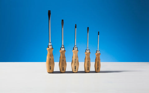 5 Piece wood handled screwdriver set with leather tips.